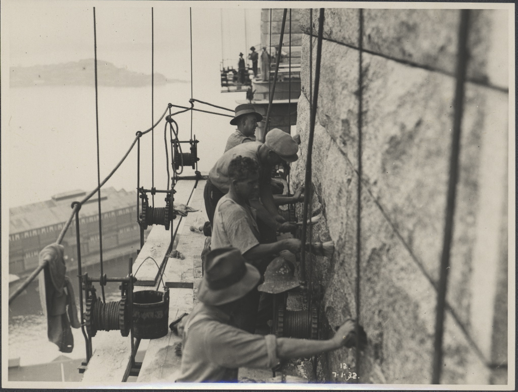 Workers on the south-western pylon of the Sydney Harbour Bridge