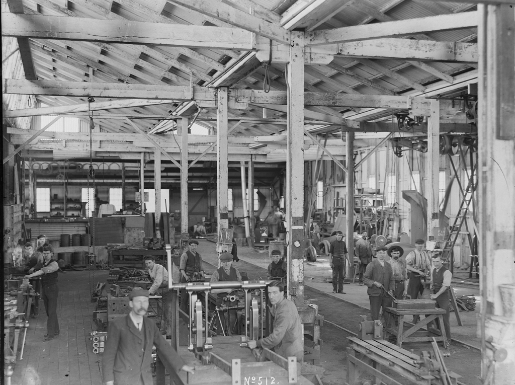 Workmen in locomotive fitting shop